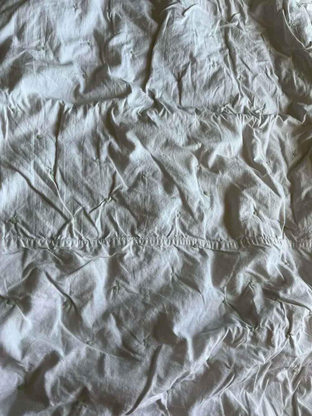 Vintage Style Baby Nursery Crib Quilt with Pom-Pom Accents and Animal Print